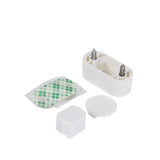 Set of white plastic components with screws on a white background