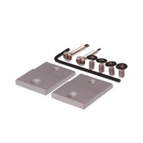 Metal brackets and screws on a white background