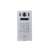 White intercom system panel with keypad and camera on a white background