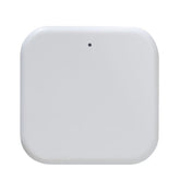 White square object with a small black dot on a white background