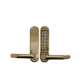 Gold electronic door handle with keypad on a white background