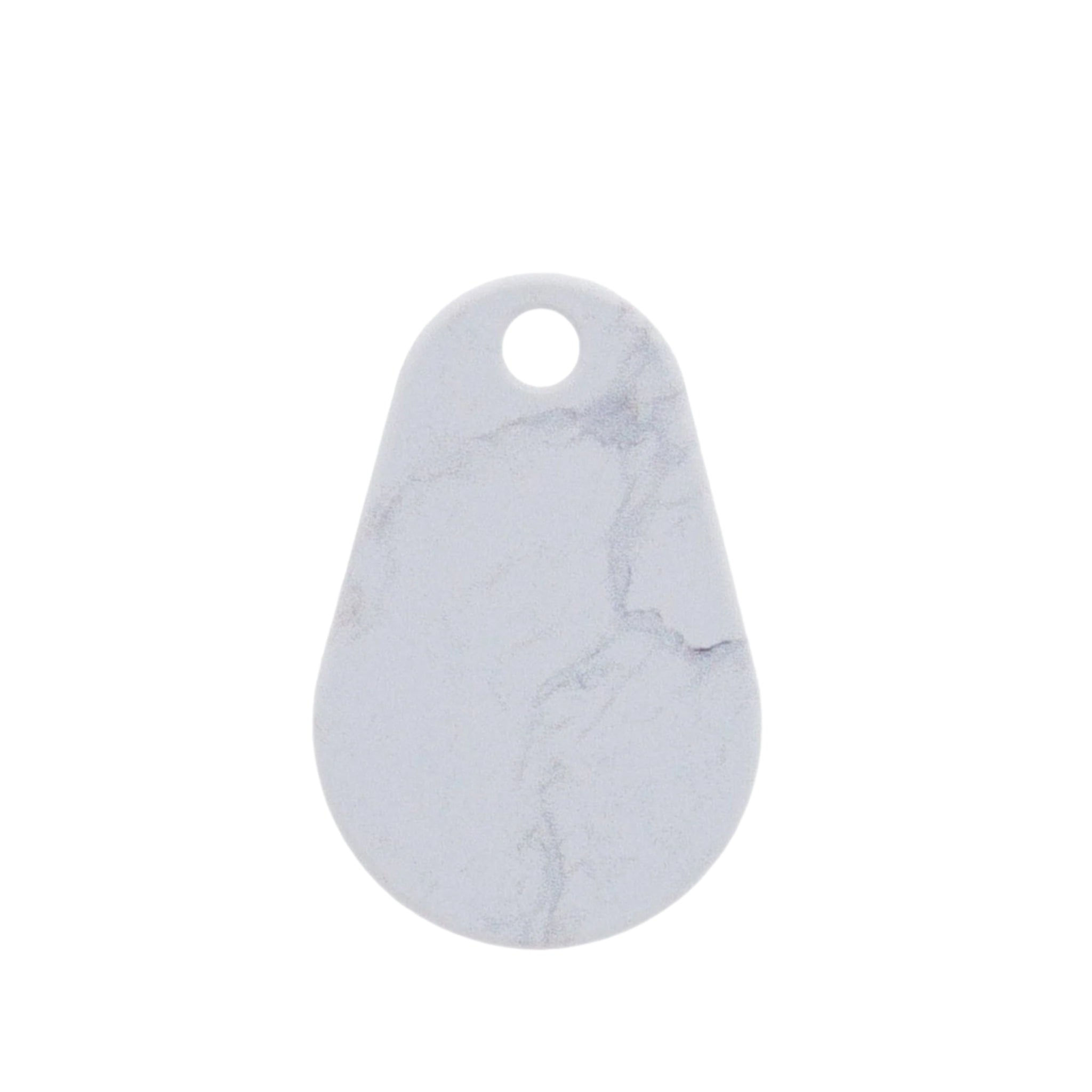 Marble-patterned cutting board with a hole for hanging on a white background