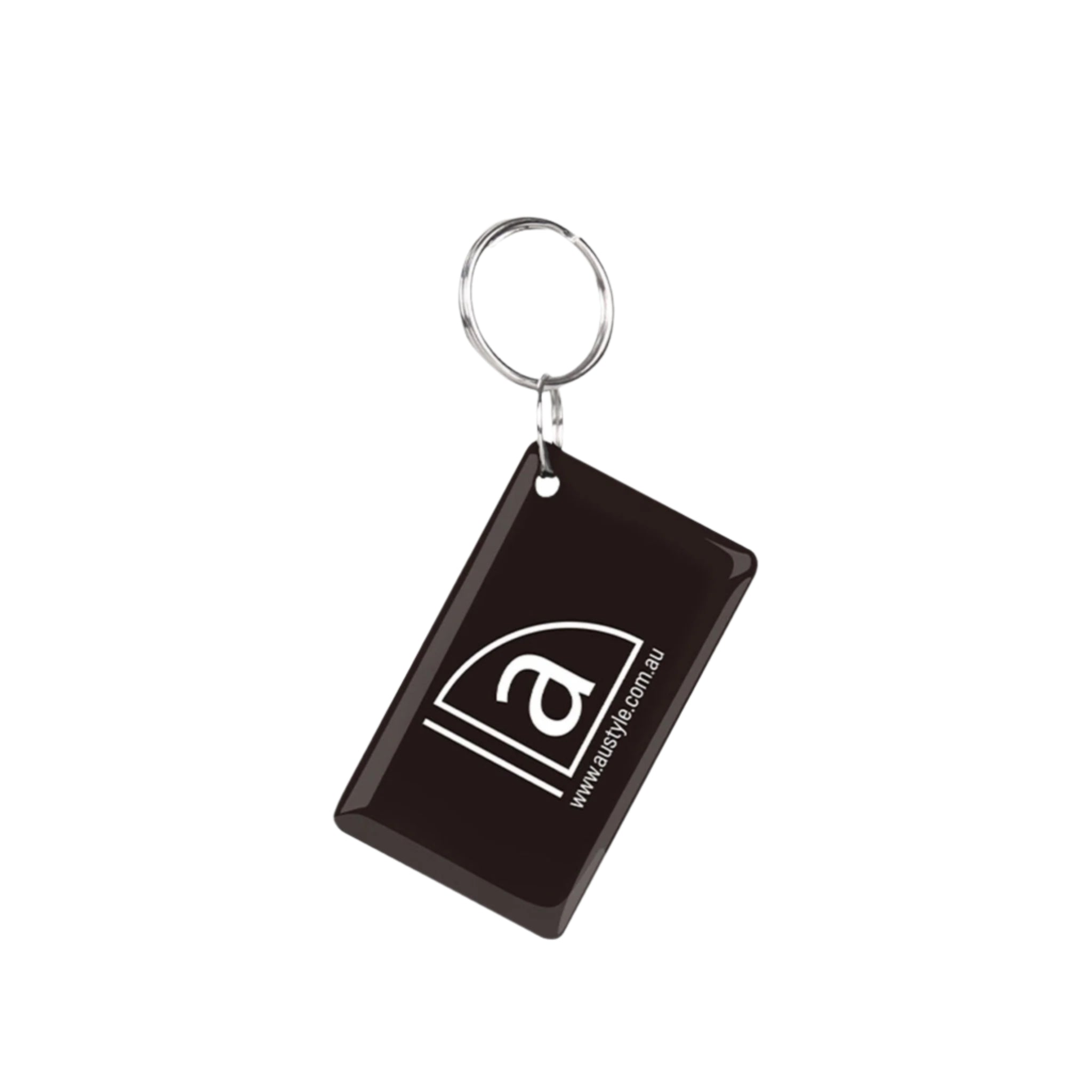 Black keychain with a white logo on a white background